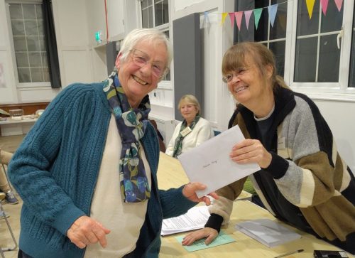 2025 AGM Marion receiving her Home Baking award from Marilyn